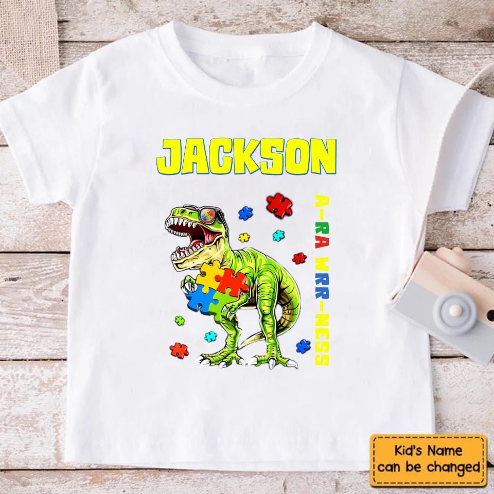 Puzzles and Dinosaurs - Personalized Name Colourful Graphic T-Shirt - A Gift for Child - OLESA