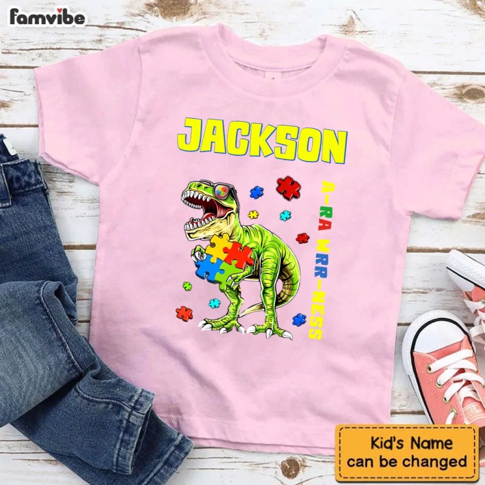 Puzzles and Dinosaurs - Personalized Name Colourful Graphic T-Shirt - A Gift for Child - OLESA